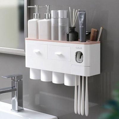 China Modern Magnetic Plastic Water Brushing Tooth Cleaner Cup Automatic Toothpaste Wash Dispenser With Toothbrush Holder for sale