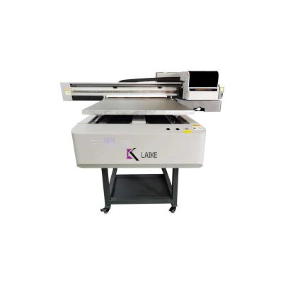 China Garment Shops Multifunctional Digital UV Printing Machine with TX800 printhead for printing glass bottle vinyl sticker for sale