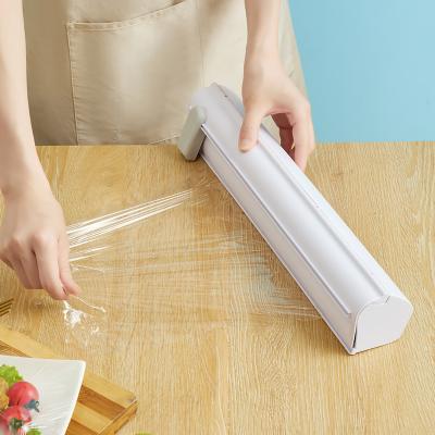 China Plastic Wrap Dispenser Moisture Proof Kitchen Cling Food Wrap Cutter Dispenser Preservative Film Cutter Kitchen Accessories for sale