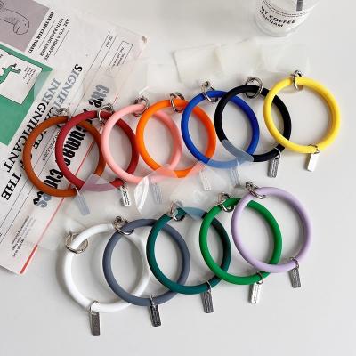 China With New Trend Phone Patch Anti Lost Silicone Wristband Ring Holder Card Mobile Cell Phone Patch Lanyard Accessories Promotional Gift for sale