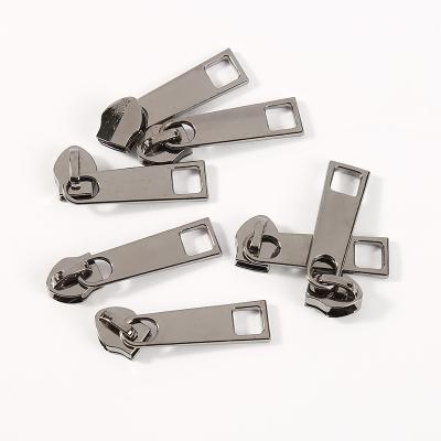 China Factory Wholesale Custom DFA Nickel Free #3 #5 Zipper Head Without Lock Metal Zipper Slider For Handbags And Apparel for sale