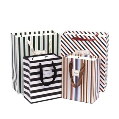 China Recyclable Machine Make Custom Fancy Paper Gift Bag With Logo Print And Handle for sale