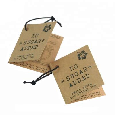 China 2022 New Design Recyled Garment Tag With String, Custom Logo Brown Kraft Paper Hang Tag For Jeans for sale