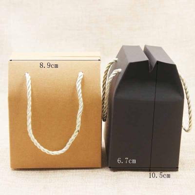 China 2022 Customs Recyclable Logo Lvory Favor Bag Pink Wedding Paper Packaging Box Lilac Gift Box With Handle Kraft Nuts Package Box for sale