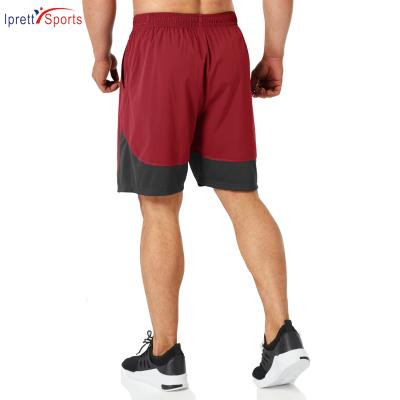 China Polyetser Quick Dry Mens Fitness Clothing Men Shorts Pants Breathable Sports Wear Gym Underpants With Pockets for sale