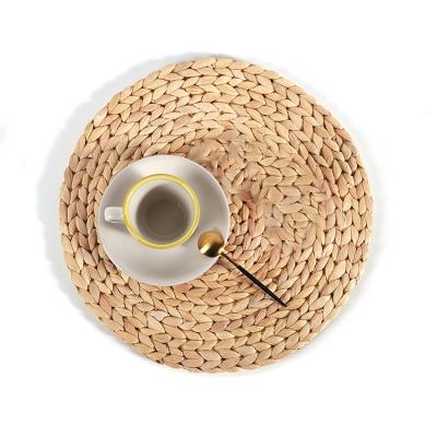 China Coastal Wholesale Natural Round Water Hyacinth Manual Woven Placemats for sale