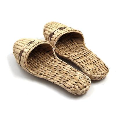 China New Handmade 2022 Pure Handbook Women And Ladies Plain Woven Straw Slippers Flat Sandals for sale