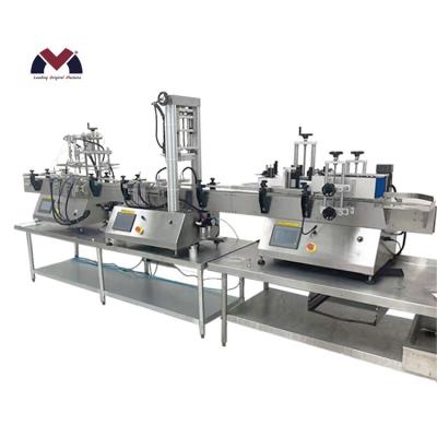 China 2021 Hot Tour Bottle Filling Food Labeling Machine Capping Production Line for sale