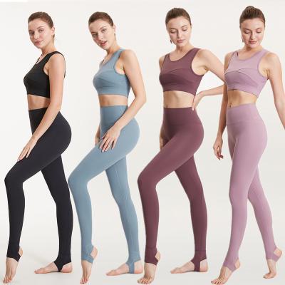 China Breathable Women Seamless Active Fitness Wear Gym Wear Sportswear 2 Piece Yoga Sets Bra And Leggings Sets Workout Stirrup Leggings Suit for sale