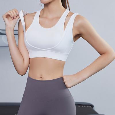 China Full Coverage Sports Bra Cups Logo White Crop Top Fitness Yoga Breathable Custom Running Cavity Removable Bra Push Up Gym Tops for sale