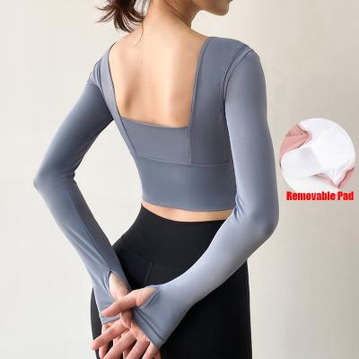 China Custom Logo Athletic Wear High Stretch Women Fitness Yoga Clothing Gym Long Sleeve Crop Top Breathable Crop Top Workout Shirt With Bra for sale