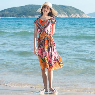 China Breathable Bohemian Dress Summer Female Fashion Use Cotton Floral Printing Mother Seaside Vacation Beach Silk Skirt Large Size for sale