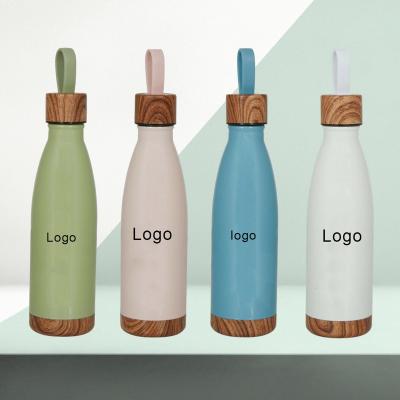 China Custom Stocked Logo Insulated 500ml Stainless Steel Thermos Water Bottle With Wooden Lid for sale