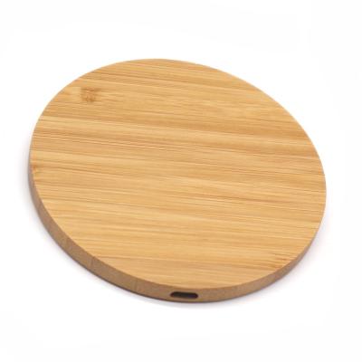 China Custom 10W 5W Qi Small Wooden Bamboo Wireless Charger Fast Radio Charging Mobile Phone for sale