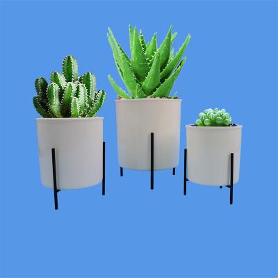 China Econo wholesale minimalist 4 5 6 8 inch style plastic flower pot modern living room decoration with iron frame base for sale