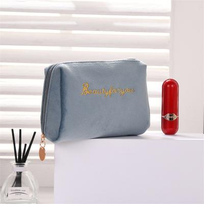 China Professional Cosmetic Pouch Bag Black Suede Velvet Fashion Beauty Makeup Bag Zipper Custom Luxury Travel Closure With Embroidery Logo for sale