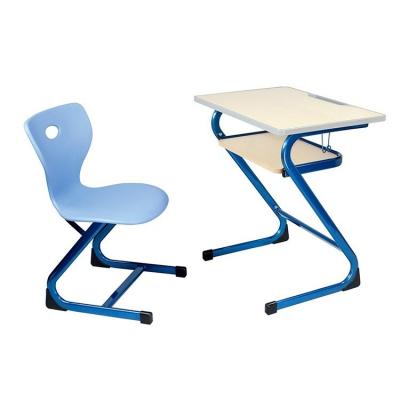 China Comfortable Cheap Simple School Furniture Student Desk And Chair With Blue Iron Drawer for sale