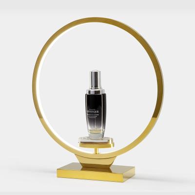 China High Quality Eco-friendly Luxury Skin Care Gold Color LED Circle Metal Circle OEM/ODM Cosmetic Display Stand Light for sale