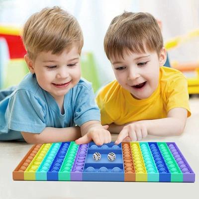 China New Decompression Push Noise Bubble Wiggle Sensory Toys Keyboard Antistress Chessboard Kids Buttons Flip Board for sale