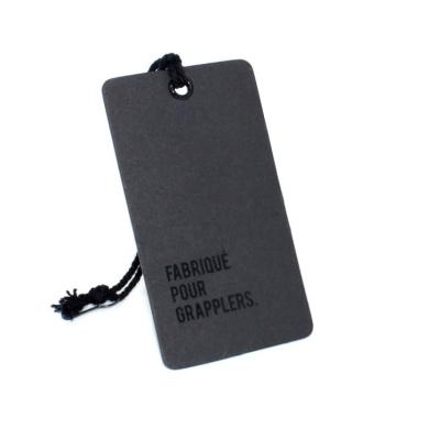 China Depossed Craft Sustainable Wholesale Hang Tag Black Paper Printing Paper Hang Tags for sale