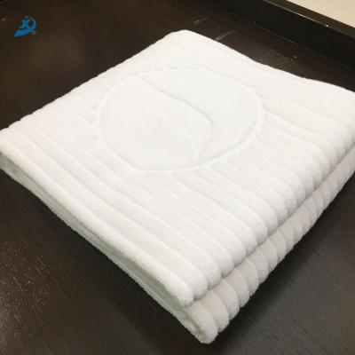 China Hot Sale Compressed White Cotton Terry Jacquard Hotel Hand Towel for sale