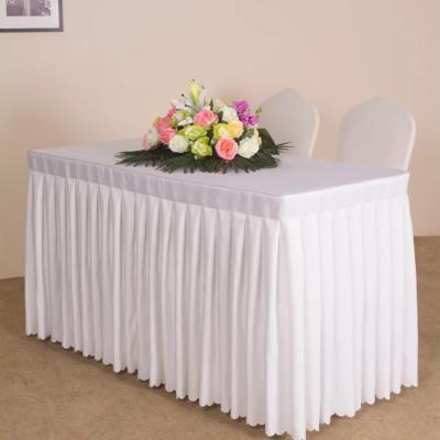 China Decorative Oilproof Wedding Meeting Polyester Ruffled Table Skirts Table Cloth for sale