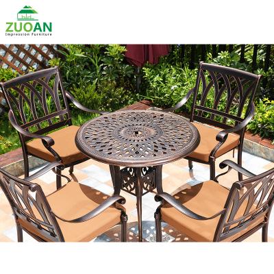 China Weather Resistant Metal Furniture Backyard Poolside Dining 5pcs Outdoor Garden Patio Table Set Cast Aluminum for sale