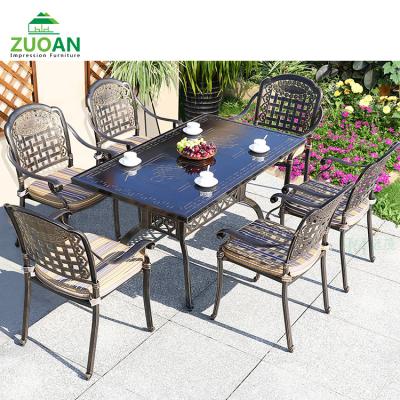 China Factory Sale Professional Weather Resistant Table Chair 7 Pcs Dining Bistro Patio Set Garden Cast Aluminum Outdoor Furniture for sale