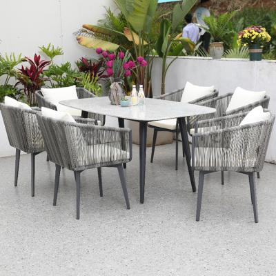 China Weather Resistant Outdoor Furniture Wicker Patio Garden Rattan Aluminum Dining Table Chairs Set for sale