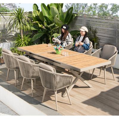 China Eco-friendly plastic wooden retractable table set garden furniture rattan rope chair waterproof outdoor for sale