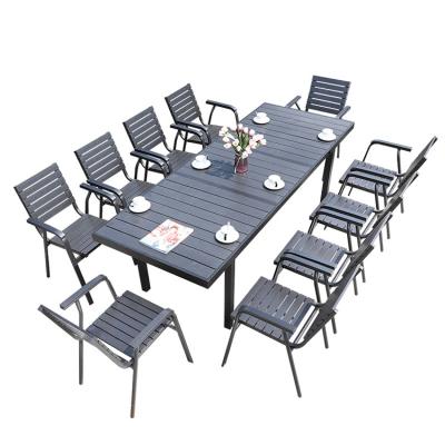 China Waterproof Eco Friendly Recycled Black Wood Plastic Table And Chairs Outdoor Furniture Compounds 11pcs for sale