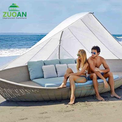 China Modern beach hotel sofa leisure beach lounge chair shade pe wicker wicker daybed with canopy for sale