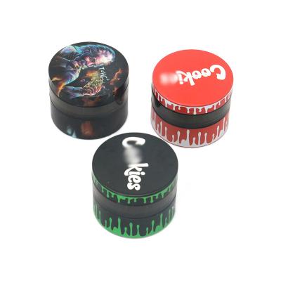 China 2022 New 55mm Metal Grinders 55mm Biscuit Plastic Herb Herb Tobacco Grinding Plastic Grinder Custom Logo 3-Layer for sale