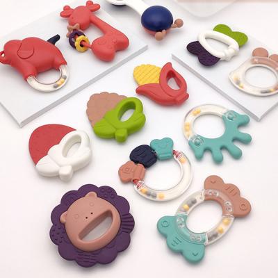 China BPA Free New Arrival 20 Designs Cute Animals Baby Teething Soft Toys Food Grade PP Silicone Baby Rattle Toys for sale