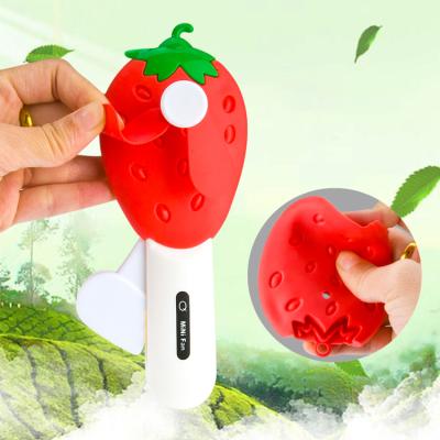 China 2020 Outdoor Gift Hand Press Fruit Mini Toy Fan Fan Blade Manually Holding Plastic Toy Cute Cartoon Fan Toy for sale