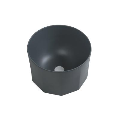 China Modern Unique Design Ceramic Countertop Wash Sink Matte Black Art Basin For Hotel for sale