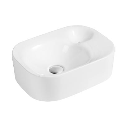 China Modern Ceramic China Cabinet Countertop Bathroom Art Basin With Soap Holder for sale