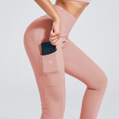 China 2021 New Style Women Polyester Spandex Breathable Pink Leggings Pants Fitness Set Plus Size Butt Lift Yoga Pants With Pocket for sale