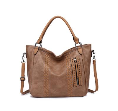 China Water proof 2022 newest wholesales ladies summer hollowed out luxury handbag ladies tote bag with long shoulder strap for sale