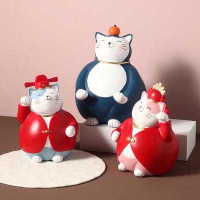 China Friendliness Hand Made Cat Mobile Phone Holders And Blue Cat Couple Resin Craft Decor China Red For Home Decoration for sale