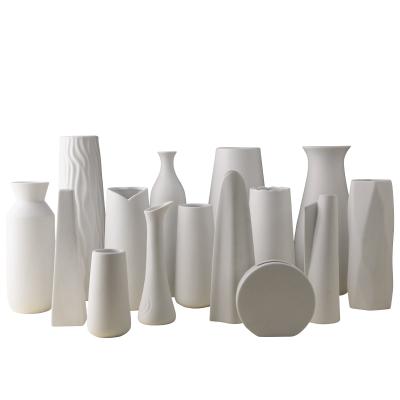 China High quality handmade white ceramic vase stocked porcelain flower vase for ceramic home decor for sale