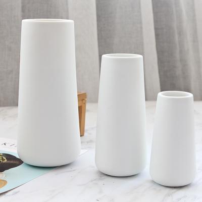 China INS Modern Wedding Vases Porcelain Stocked Decorative Options 4 Same Style Custom Logo Vases White Ceramic Vase Set for sale