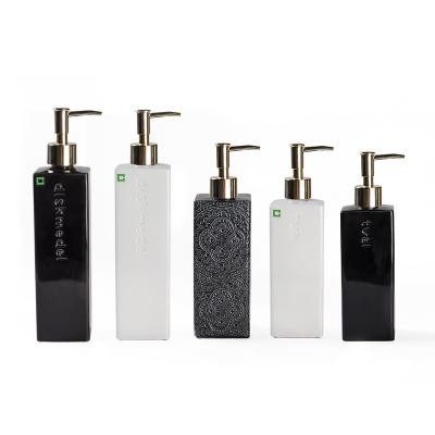 China Black White Stocked Impress Ceramic Bottle Bathing Room Set Body Bath Lotion Porcelain Shampoo Bottle Set Bathroom Sets for sale