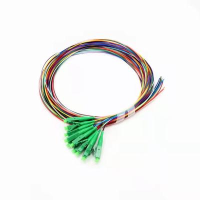 China Custom FTTH Armored Pigtail Fiber Optic Pigtail Cable 1/2/3/5/7/9/10m Length LC/APC Colors 12 Ceramic Fiber 0.9mm 1.5M FTTH Zirconia for sale