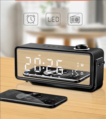 China Show fashion 2.0 video channel information alarm clock stereo FM radio wireless bluetooth portable speakers with bracket for sale