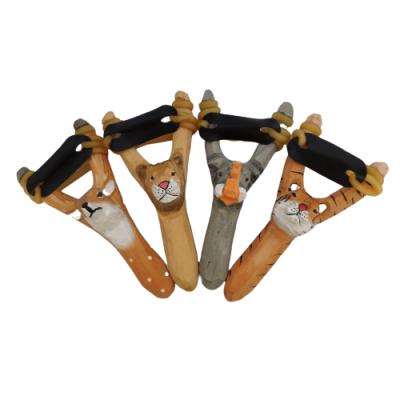 China Africa Wrist Slingshot Wooden Hand Carved Animal Craft Hunting Wooden Toy Catapult for sale