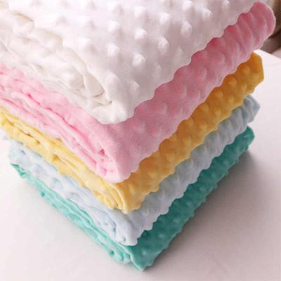 China Hot Selling Tear-Resistant Minky Dot Plush Blanket Fabric Embossed Bubble Baby Cuddle Super Soft Ins Poly for sale