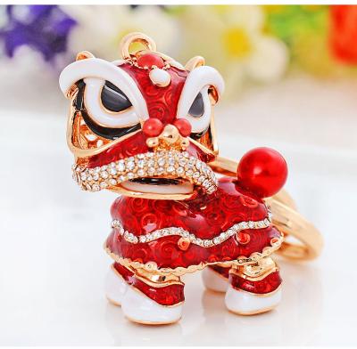 China CLASSIC Wholesale Metal Lion Bag Crystal Rhinestone Porcelain Pendant Key Chain Accessories For Women Girl for sale