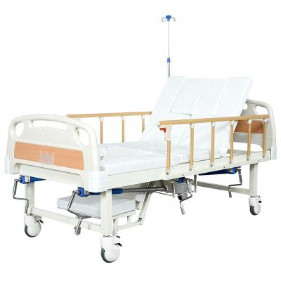 China Multi Function Metal Medical Health Care Bed Patient Manual Nursing Bed With 3 Cranks for sale