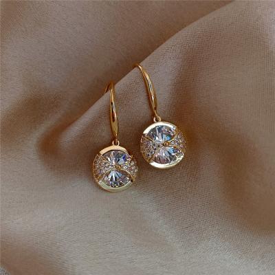 China FASHIONABLE S925 Sterling Silver Hook Earrings For Women Knotbow Hollow Shape Crystal Opal Earrings Round for sale